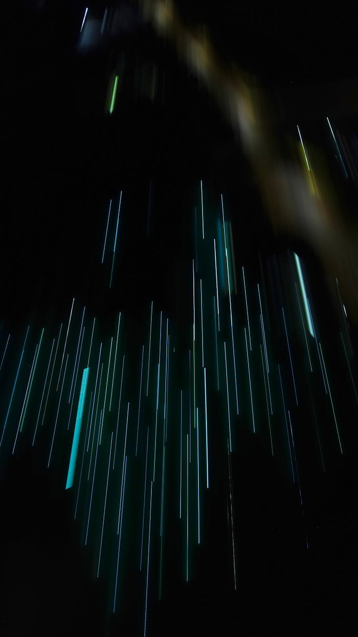 Crafting Captivating Headlines: Your awesome post title goes here Dynamic abstract image of blue light streaks in motion over a dark background.