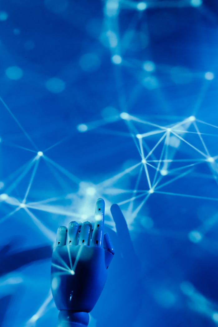 Services Futuristic robotic hand touching a digital network on a blue background.